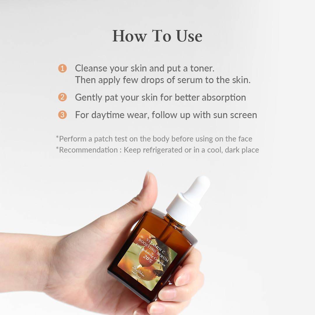 Hand holding a bottle of serum with usage instructions on a white background