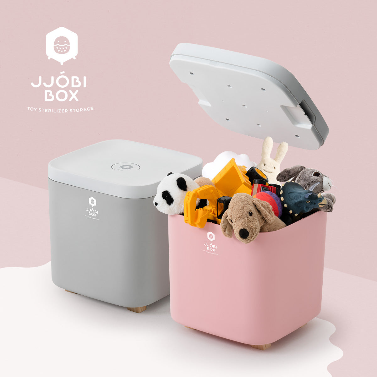 JJOBI Box toy sterilizer and storage in pink and gray – UV-C light sterilization bin filled with plush toys and kids' items, modern design.