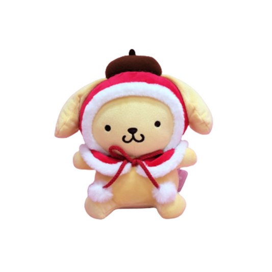 Pompompurin plush toy wearing red holiday cape with white fur trim and matching beret – cute Sanrio Christmas stuffed animal perfect for festive gifts and kawaii collectors.