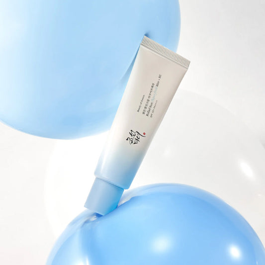 Tube of cream with blue accents on a light blue background