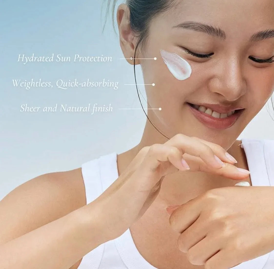 Woman applying sunscreen with text highlighting product features on a light blue background