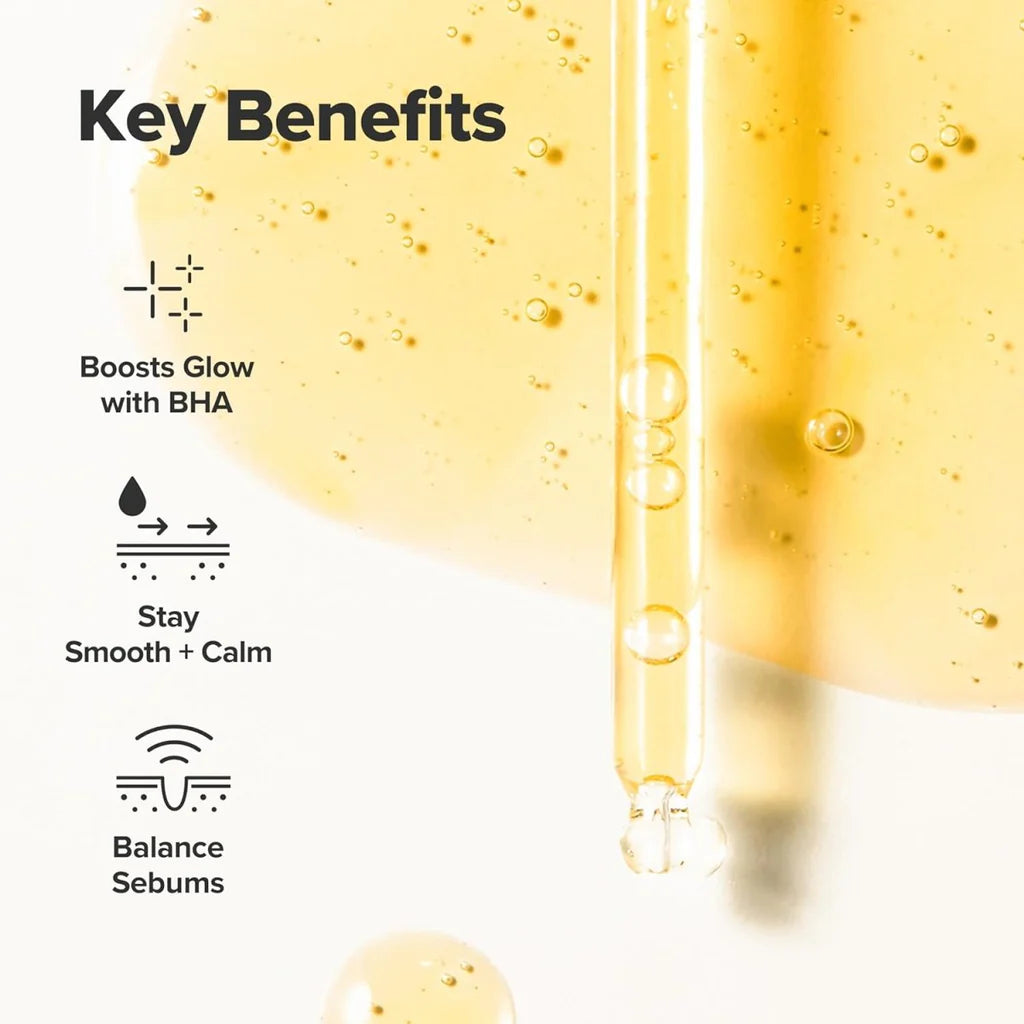 Skincare product with dropper and text highlighting key benefits on a white background