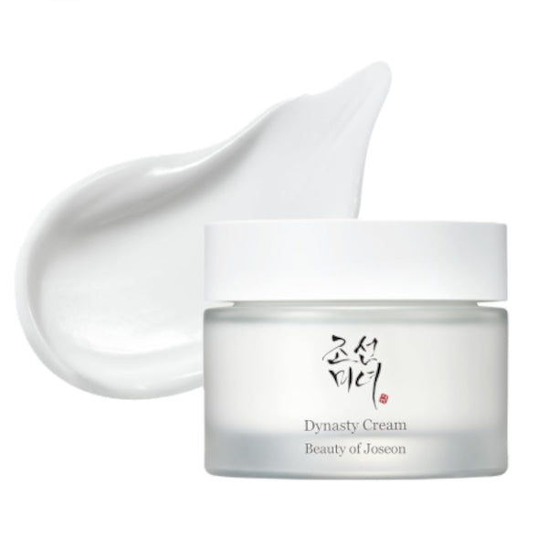 Jar of Dynasty Cream with a swatch of cream on a white background