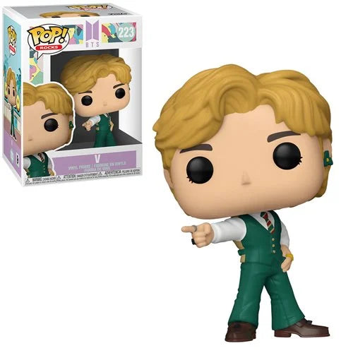 Funko Pop! Rocks BTS Dynamite V vinyl figure #223 wearing a green vest suit and pointing in a finger-gun pose; collectible box included in the background.