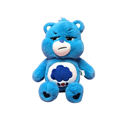 Grumpy Bear plush toy from Care Bears with blue fur, storm cloud belly badge, and heart paw prints – licensed collectible stuffed animal.