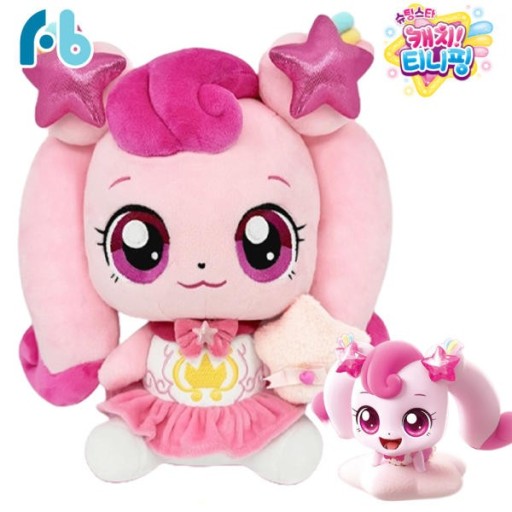 Catch! Teeniping Heartsping plush doll featuring pink pigtails with glitter star clips, pink swirl bangs, magenta eyes, a frilly tutu skirt, and a royal crown emblem on the chest. Includes a small pink blanket.