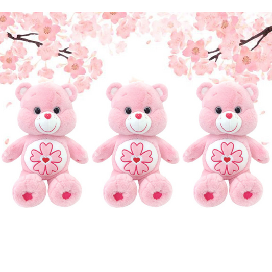 "Cherry Blossom Bear Care Bears plush toy in pink with cherry blossom heart belly badge – soft collectible stuffed animal gift for kids, spring lovers, and Care Bears fans"