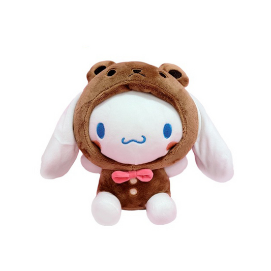 "Cinnamoroll Sanrio plush toy in brown bear costume with pink bowtie – soft kawaii stuffed animal for collectors, kids, and fans of cute character outfits"