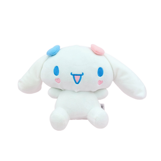 "Cinnamoroll Sanrio plush toy with heart blush cheeks, blue and pink ears, and playful tongue-out smile – kawaii stuffed animal for kids, collectors, and gift lovers"