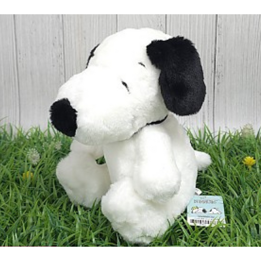 Classic Snoopy plush toy with black ears and a soft white body, timeless stuffed animal for Peanuts collectors.