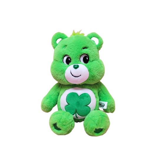 "Good Luck Bear Care Bears plush toy in green with four-leaf clover belly badge – soft stuffed animal for kids, collectors, and St. Patrick’s Day gifts"