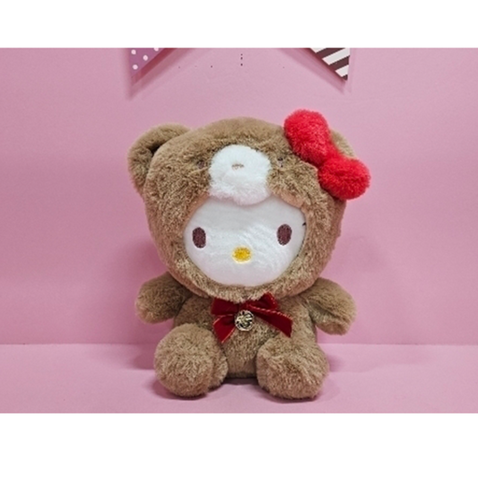 “Hello Kitty wearing brown latte bear costume plush – unique Sanrio stuffed animal with red bow and fuzzy bear suit, great for cozy gift lovers.”