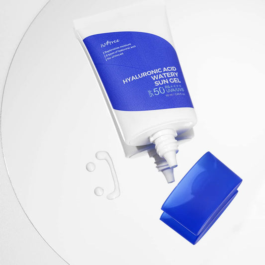 Blue and white sun gel bottle with pump on a light gray background
