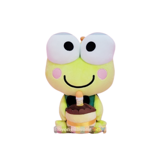Keroppi frog plush holding a birthday cake with candle, smiling brightly with large eyes.