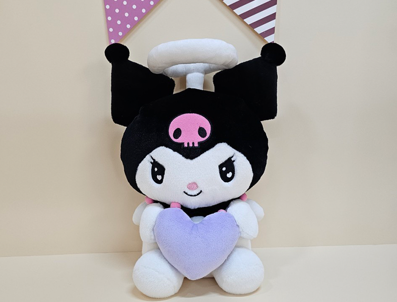Sanrio Kuromi Angel 2 plush doll holding a purple heart, wearing a jester hat with pink skull, 25cm stuffed toy