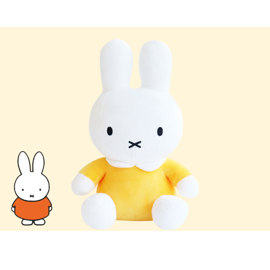 Soft and huggable Miffy plush in a bright yellow dress, officially licensed and perfect for children or collectors.