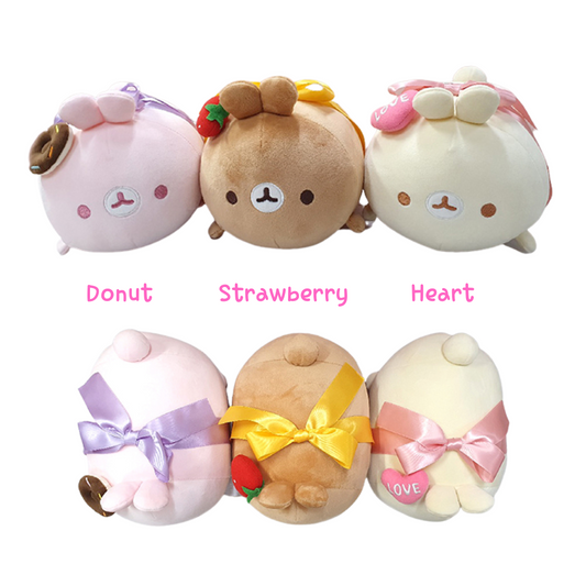 Set of three kawaii bunny Molang plush toys featuring donut, strawberry, and heart themes with pastel bows and soft round shapes, perfect for gifts and collectors.