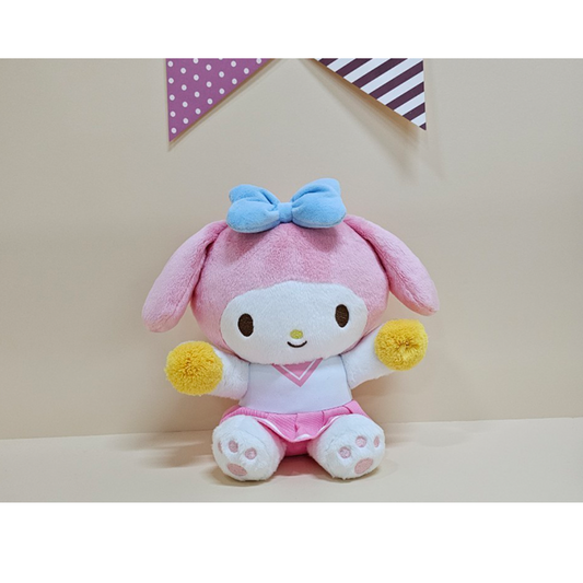 Pink and white My Melody plush in a cheerleader outfit with yellow pom-poms and a pastel blue bow, great for fans of sweet kawaii characters.