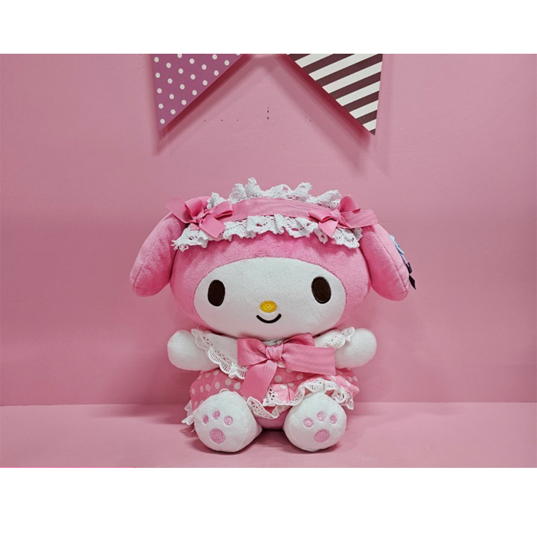 “My Melody plush in frilly pink lace maid costume – Sanrio bunny with floral headband and bows, a charming collectible for pink lovers.”