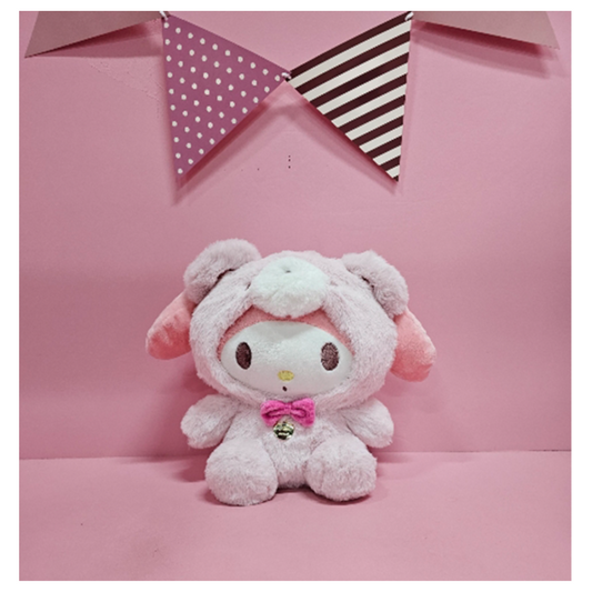 My Melody plush dressed in a fluffy bear hoodie with a pink bow and bell, displayed on a pink background.