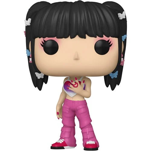 "Funko Pop! vinyl figure of NewJeans Hanni wearing pink cargo pants, a white crop top with a heart graphic, and butterfly hair clips, inspired by her signature Y2K style."