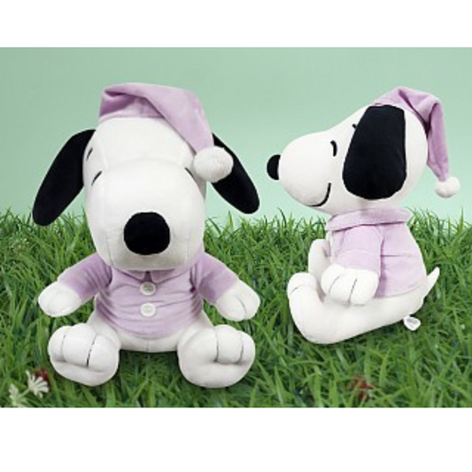Snoopy plush dolls in lavender pajamas with sleeping caps, great bedtime companions and Peanuts collectibles.