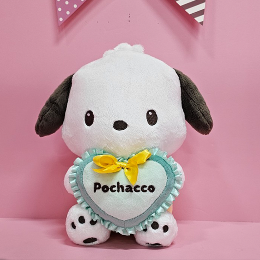 Sanrio Pochacco plush toy holding mint heart pillow with yellow bow on pink background