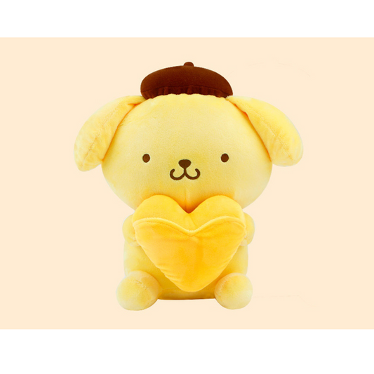 “PomPomPurin yellow plush holding a heart-shaped pillow – adorable Sanrio stuffed toy with brown beret, perfect for gifts and collectors.”