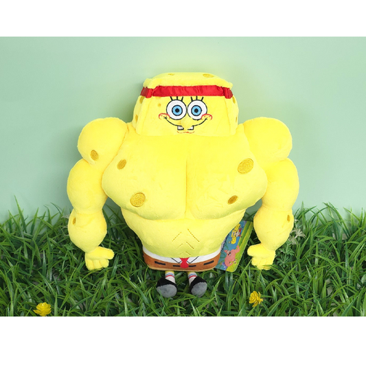 "Muscular SpongeBob SquarePants plush toy wearing a red headband and brown pants, standing on grass with a light green background – perfect for fans of fitness-themed SpongeBob merchandise."